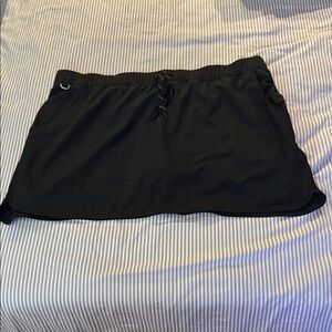Bass Pro Shops World Wide Sportsman Black Performance Skort with pockets. UPF50